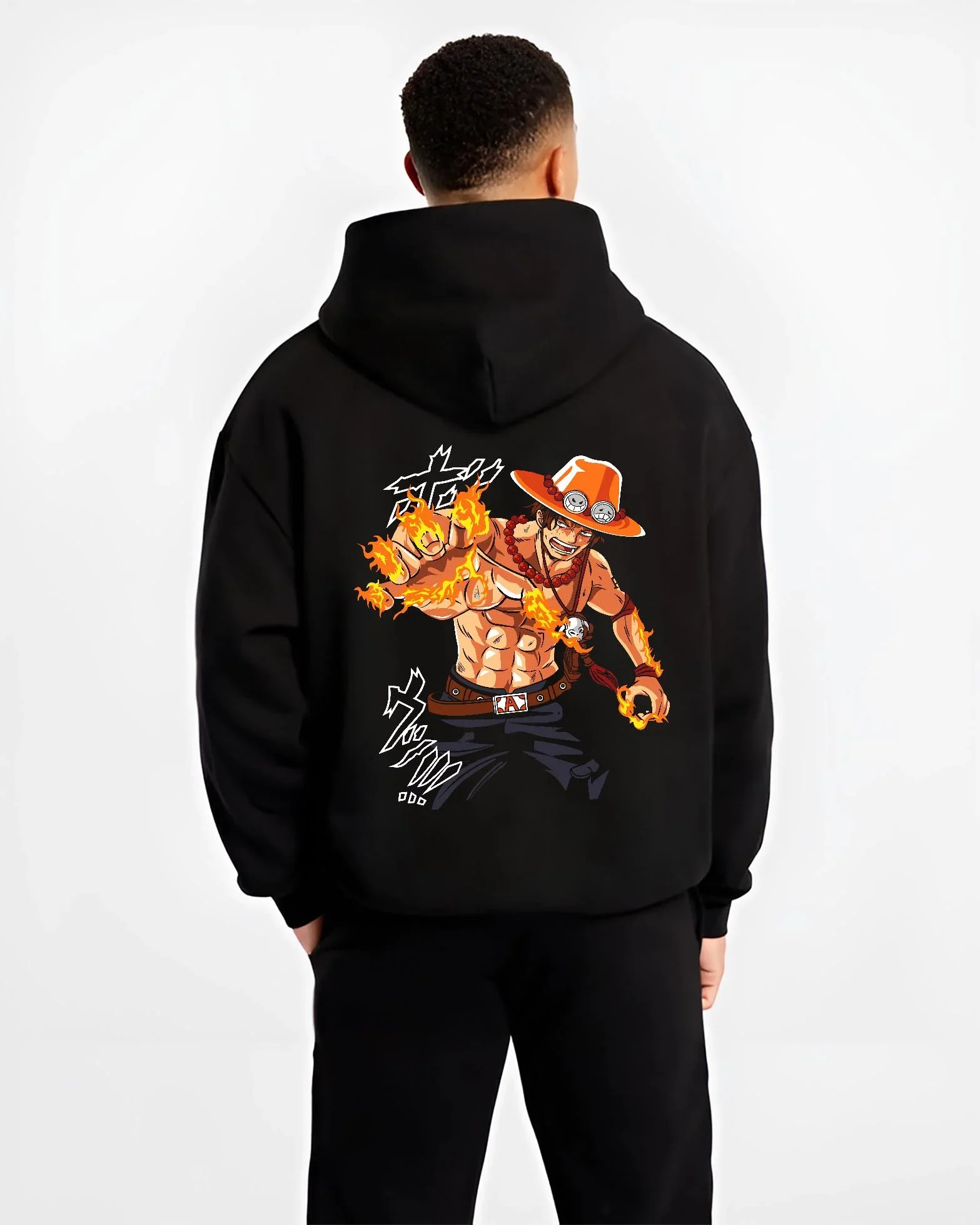 Black hoodie worn by male model, back view with Portgas Ace Blaze Hoodie One Piece Ember Aura Flames graphic streetwear graphic.