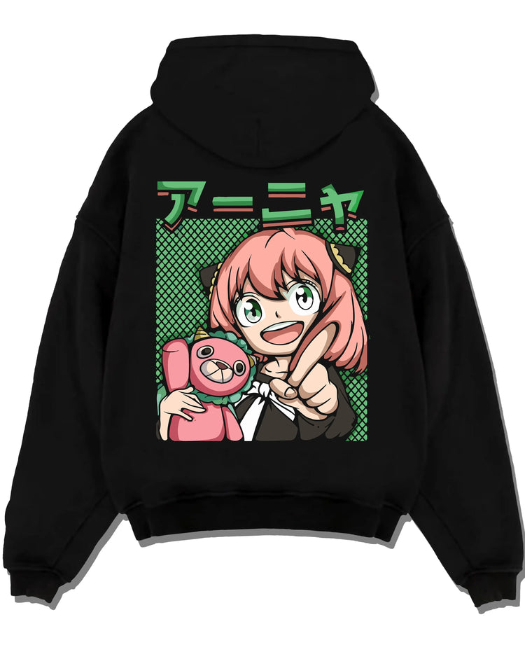 Black pullover hoodie laid flat with Anya Forger Hoodie Spy x Family Retro Pop Art Smile graphic premium wear.