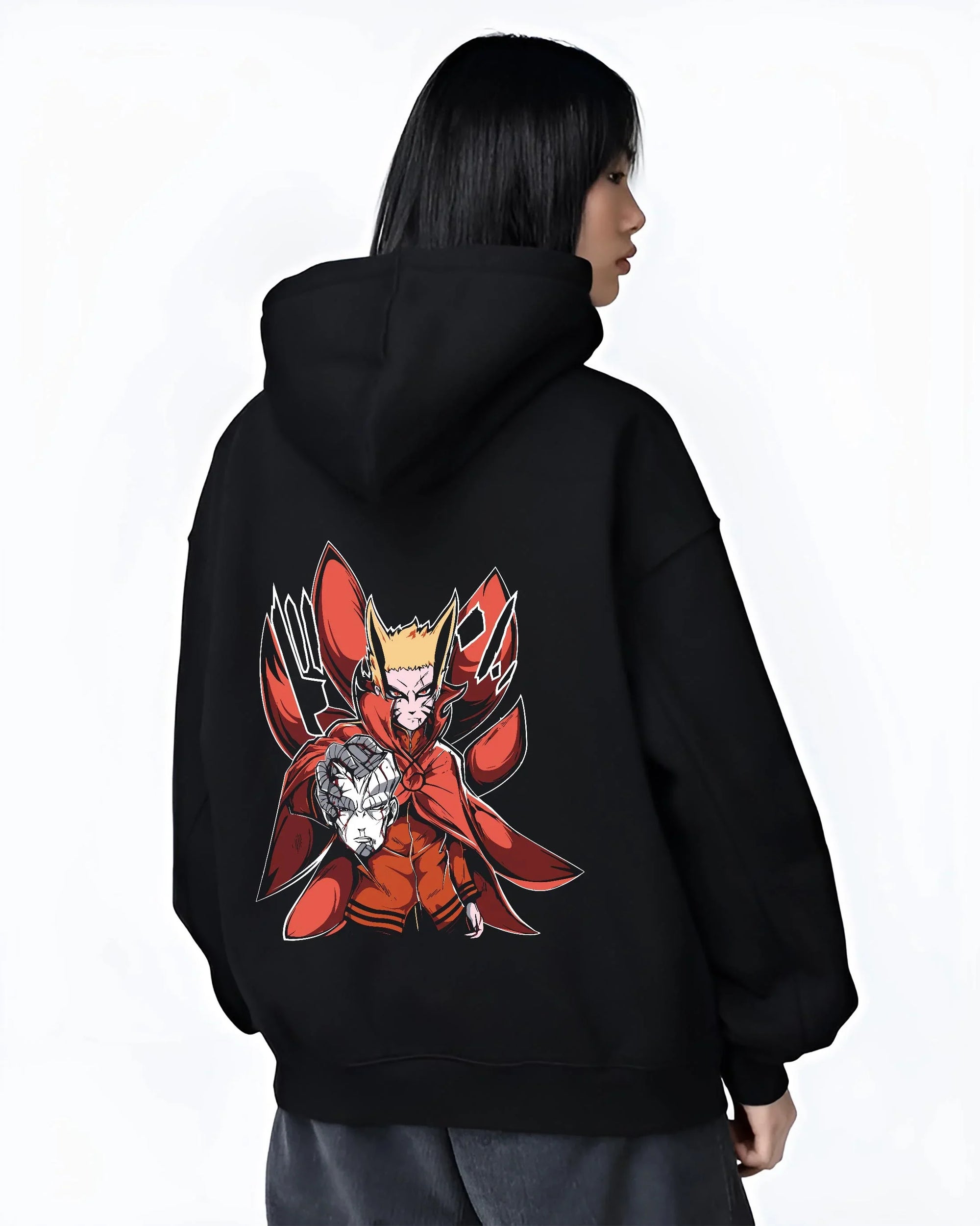 Black hoodie worn by female model, back view with Naruto Uzumaki Hoodie Baryon Mode Battle Jumper graphic streetwear graphic.