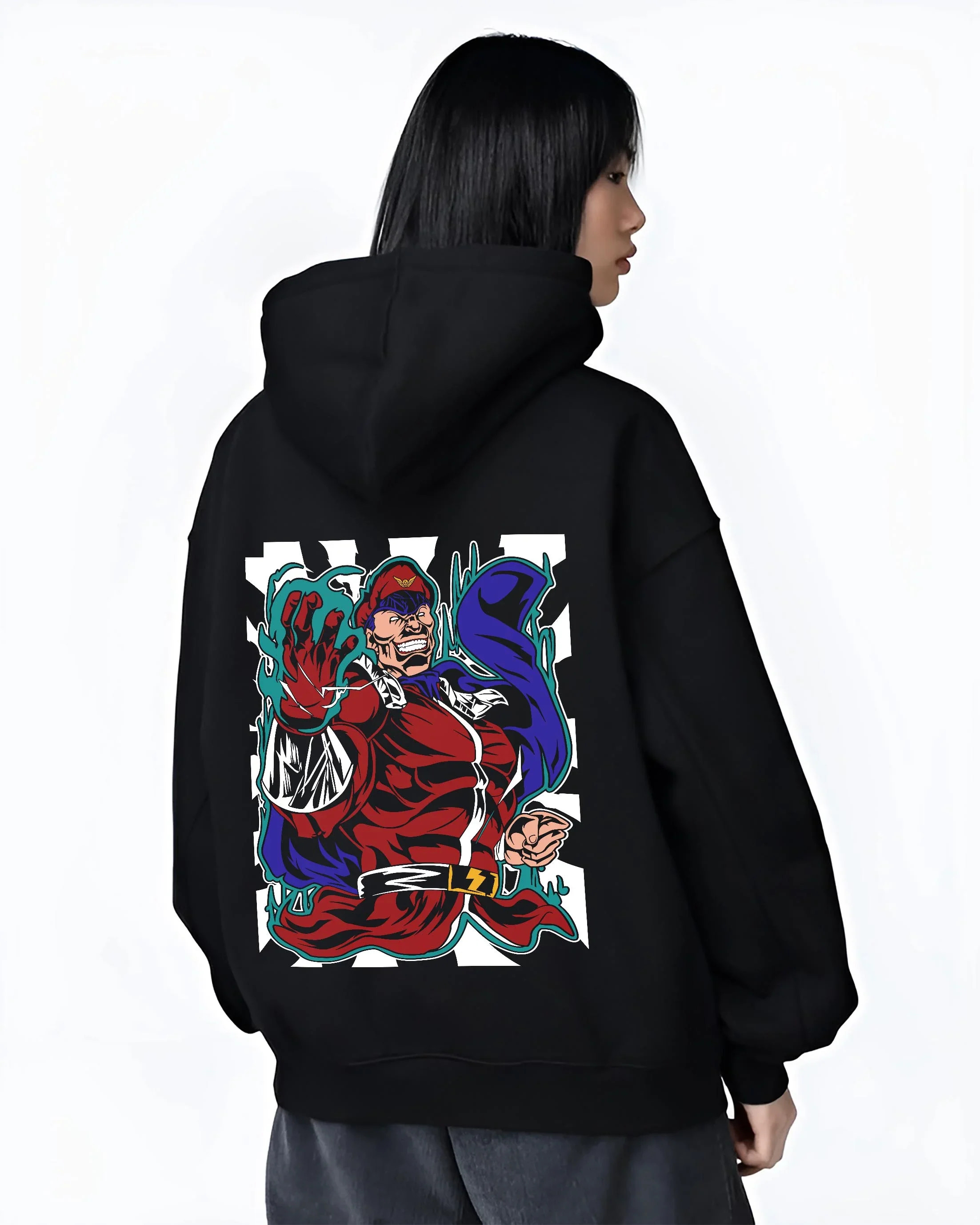 Black hoodie worn by female model, back view with M. Bison Hoodie Street Fighter Psycho Power Pose graphic premium wear.