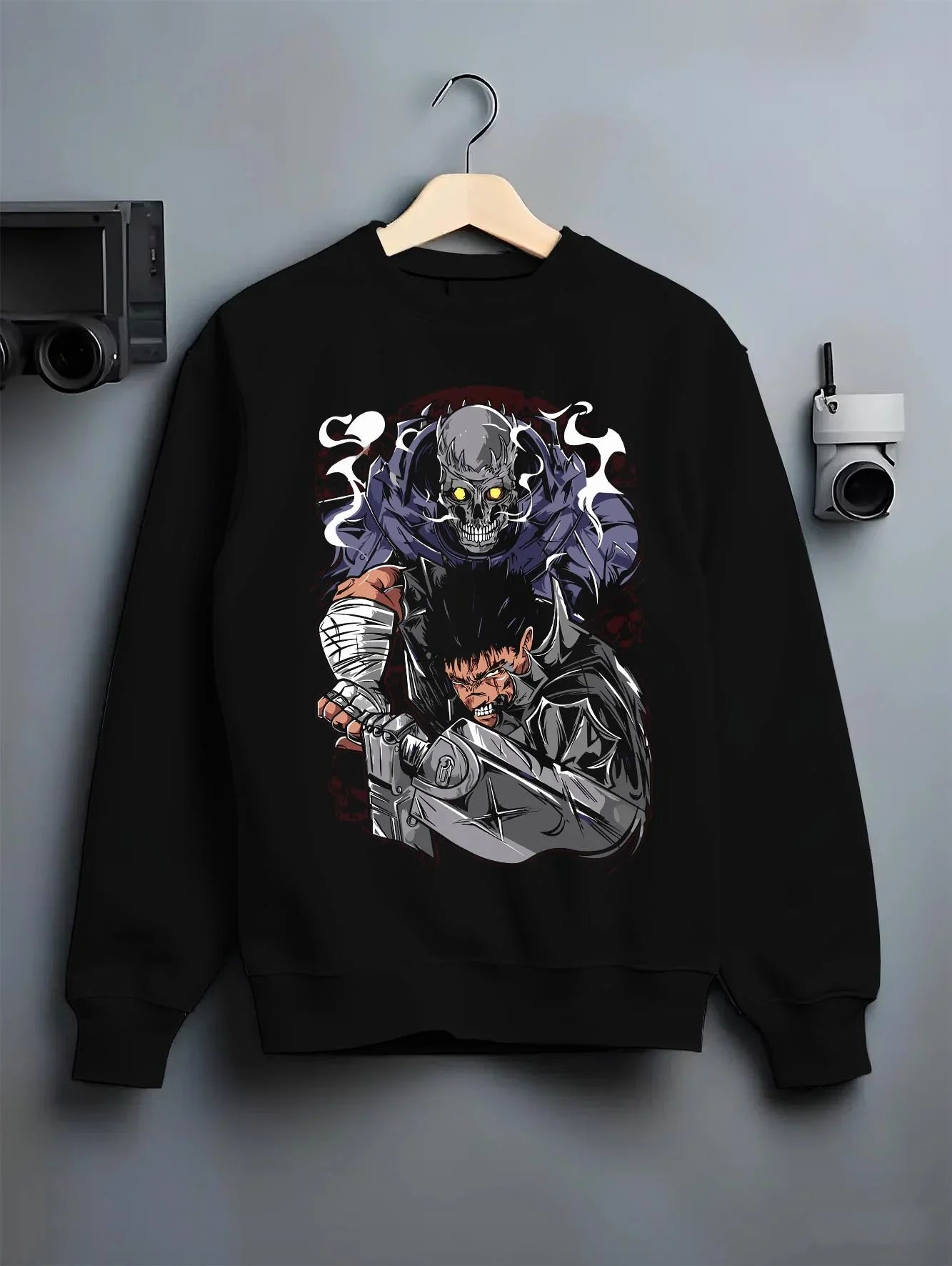 Black crewneck sweatshirt on hanger with Guts Berserk Hoodie Eclipse Hero Dark Blade Poster graphic Guts themed artwork.