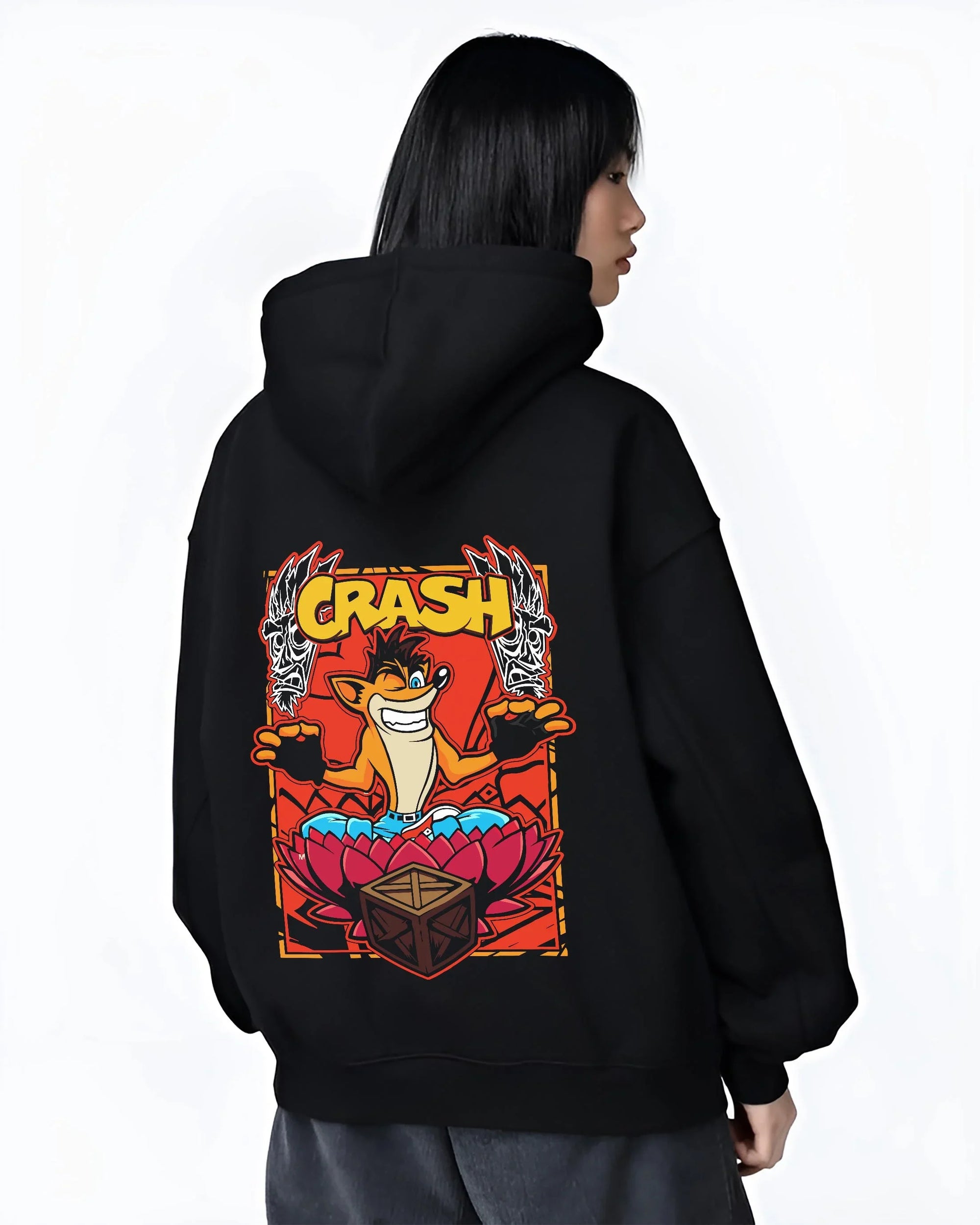 Black hoodie worn by female model, back view with Crash Bandicoot Hoodie Retro Gamer 90s Cartoon Print graphic premium wear.