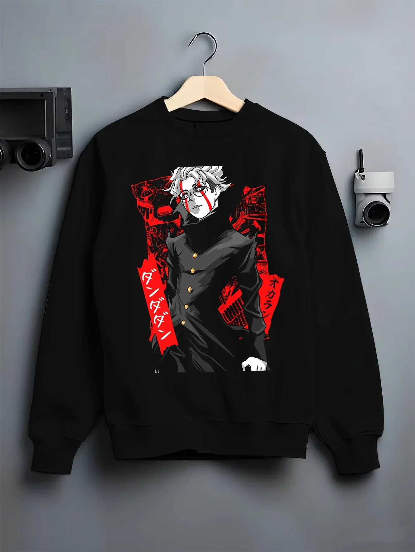 Black crewneck sweatshirt on hanger with Ken Turbo Form Hoodie Dandadan Psychic Showdown graphic streetwear graphic.