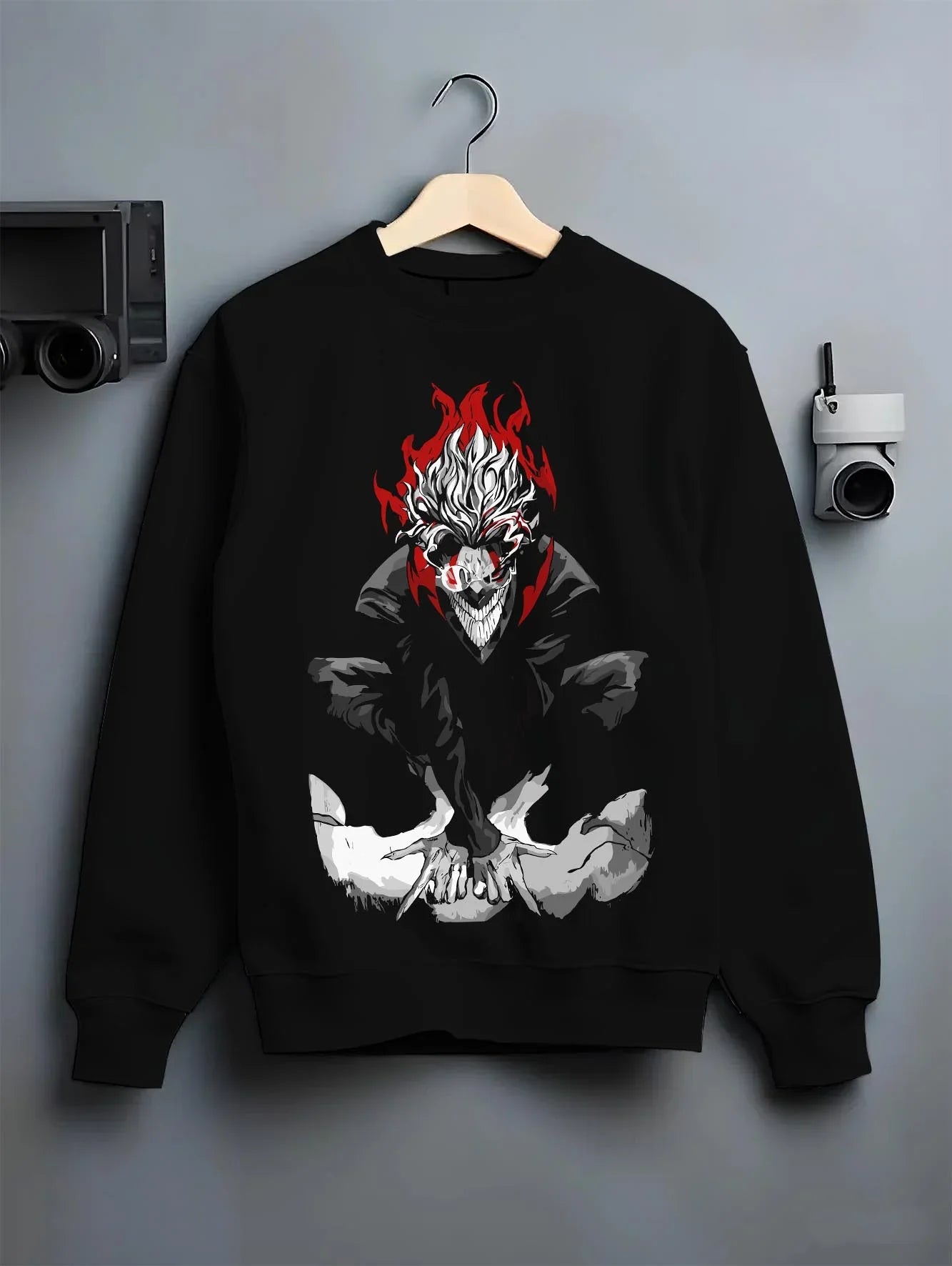 Black crewneck sweatshirt on hanger with Dandadan Hoodie Spirit Okarun Paranormal Retro Art graphic premium wear.