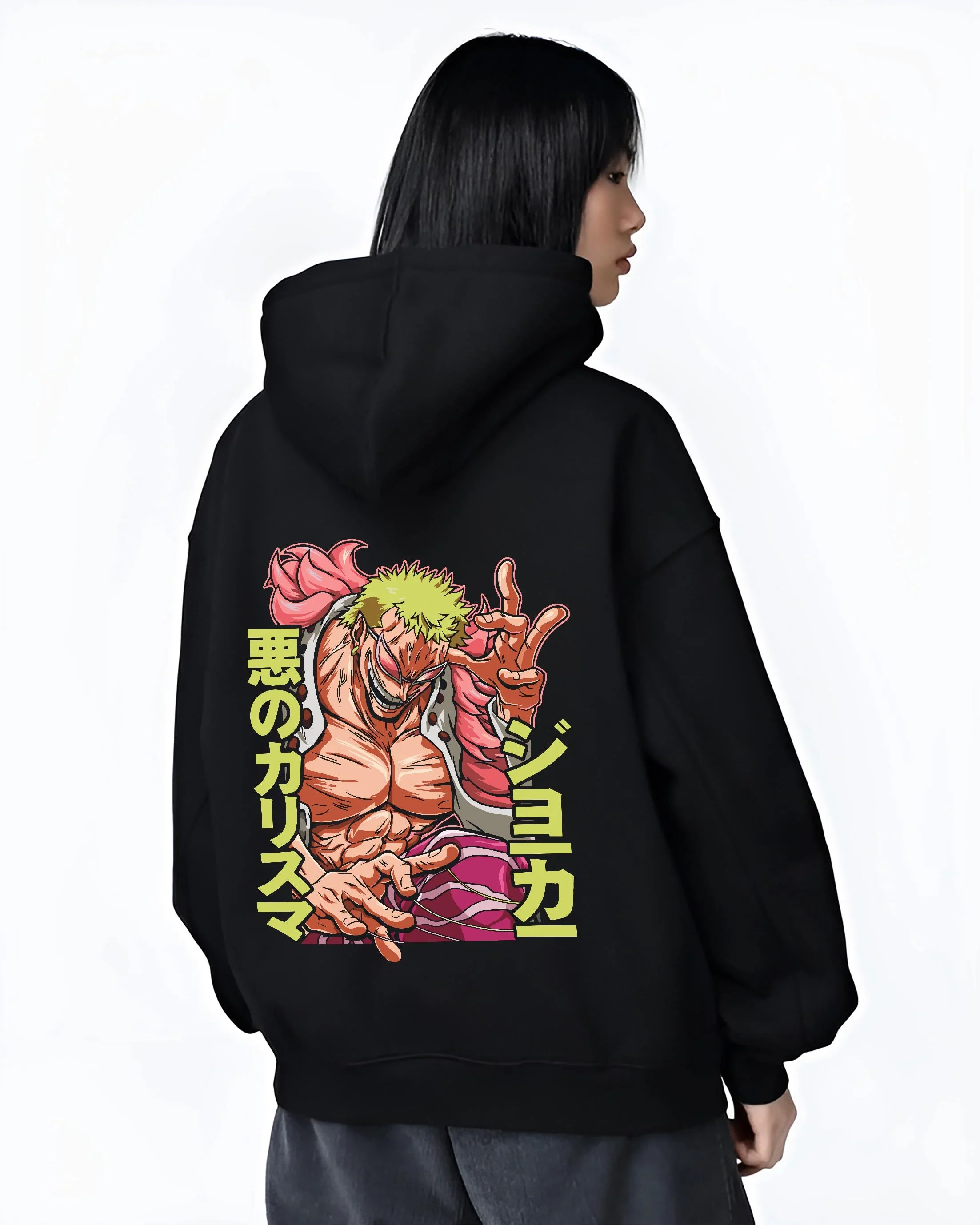 Black hoodie worn by female model, back view with Doflamingo Hoodie One Piece Retro Villain Pose Art graphic streetwear graphic.