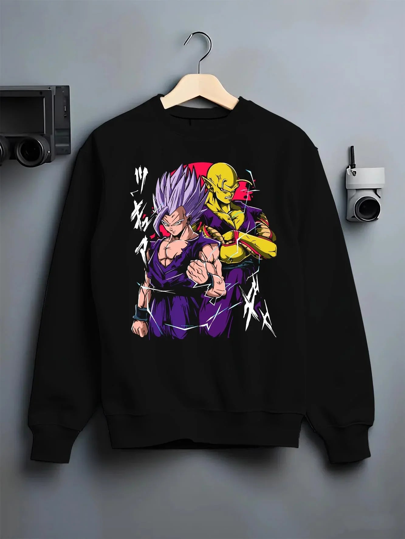 Black crewneck sweatshirt on hanger with Piccolo Hoodie Dragon Ball Z Purple Warrior Fusion graphic bold anime graphic.