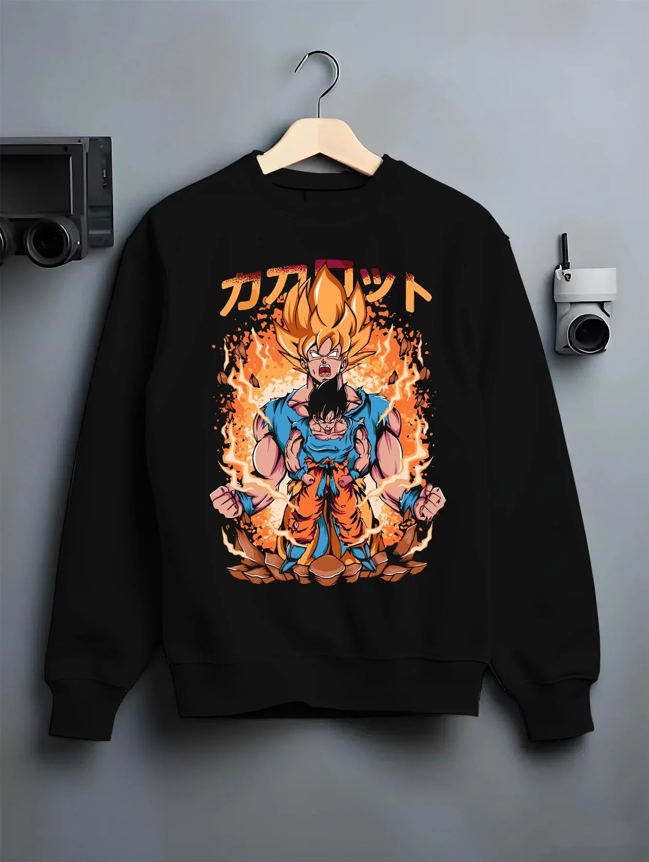 Black crewneck sweatshirt on hanger with Goku Hoodie Dragon Ball Z Super Saiyan Form Burst graphic bold anime graphic.