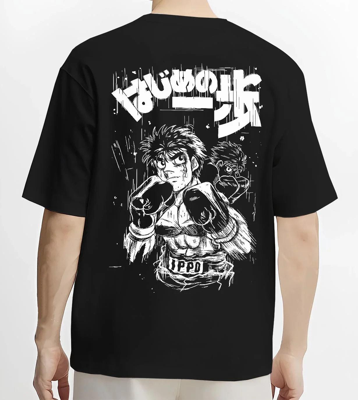 Black T-shirt worn by male model, back view with Hajime no Ippo Hoodie Ippo Makunouchi Fighting Spirit graphic streetwear graphic.