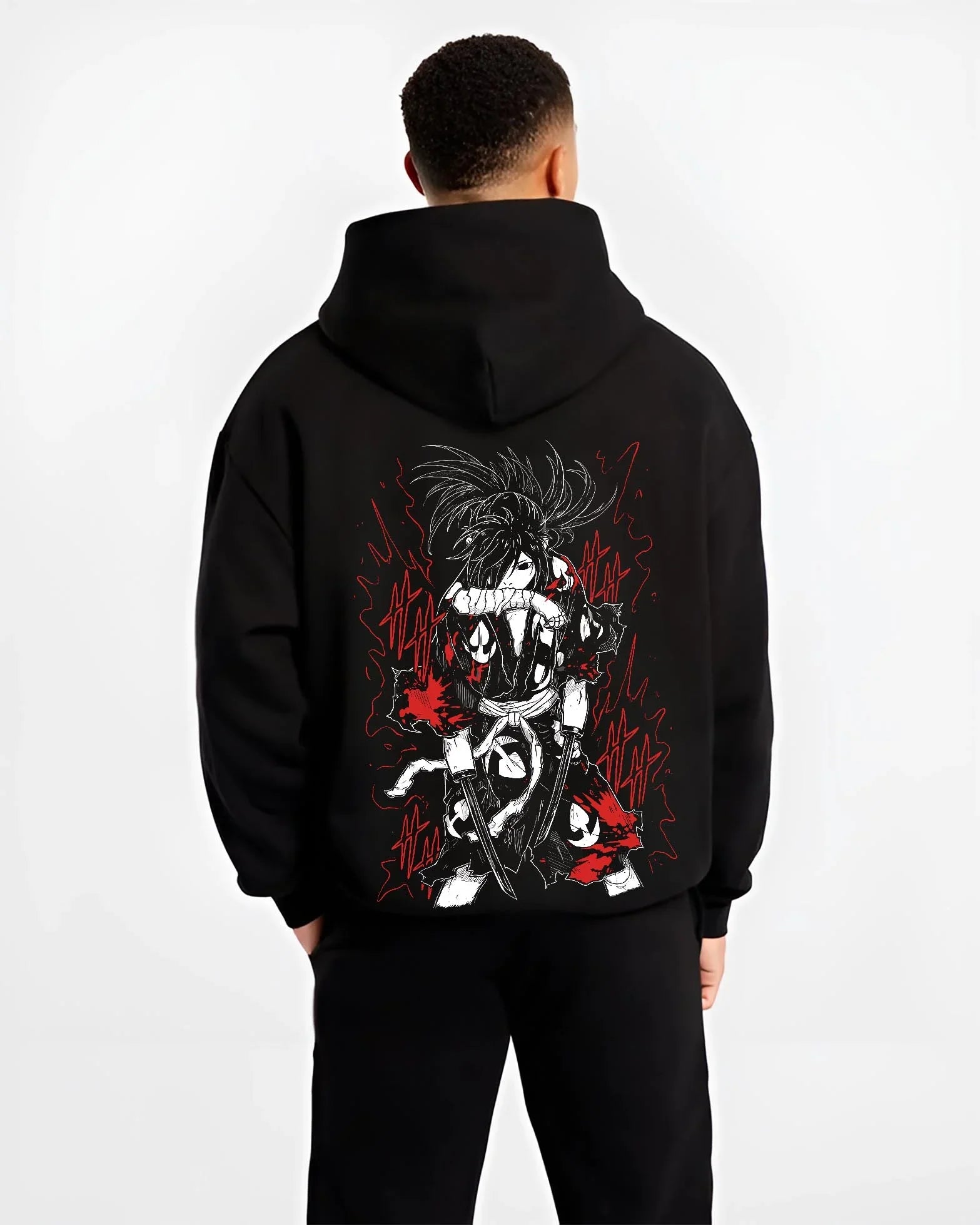 Black hoodie worn by male model, back view with Dororo Hoodie Hyakkimaru Sword Fighter Jumper graphic streetwear graphic.