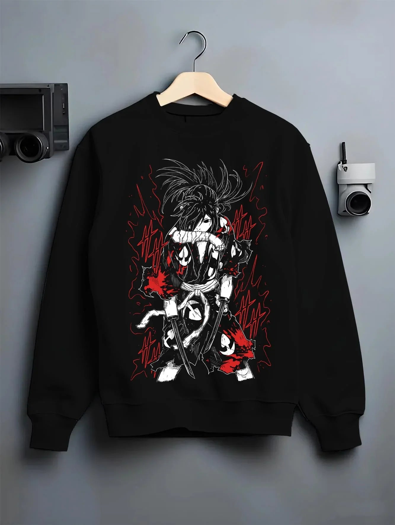 Black crewneck sweatshirt on hanger with Dororo Hoodie Hyakkimaru Sword Fighter Jumper graphic premium wear.
