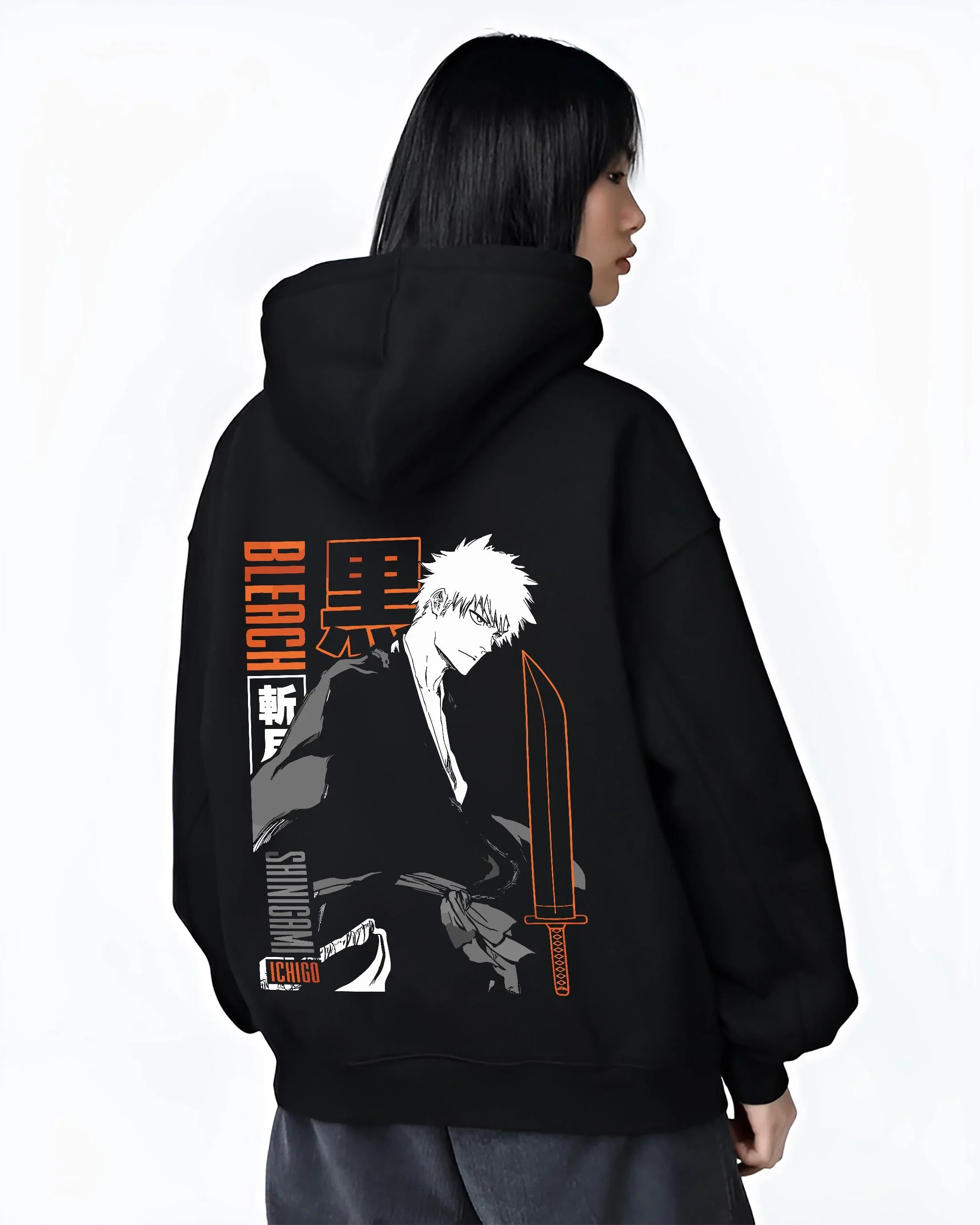 Black hoodie worn by female model, back view with Bleach Hoodie Ichigo Kurosaki Bankai Shadow Jumper graphic streetwear graphic.