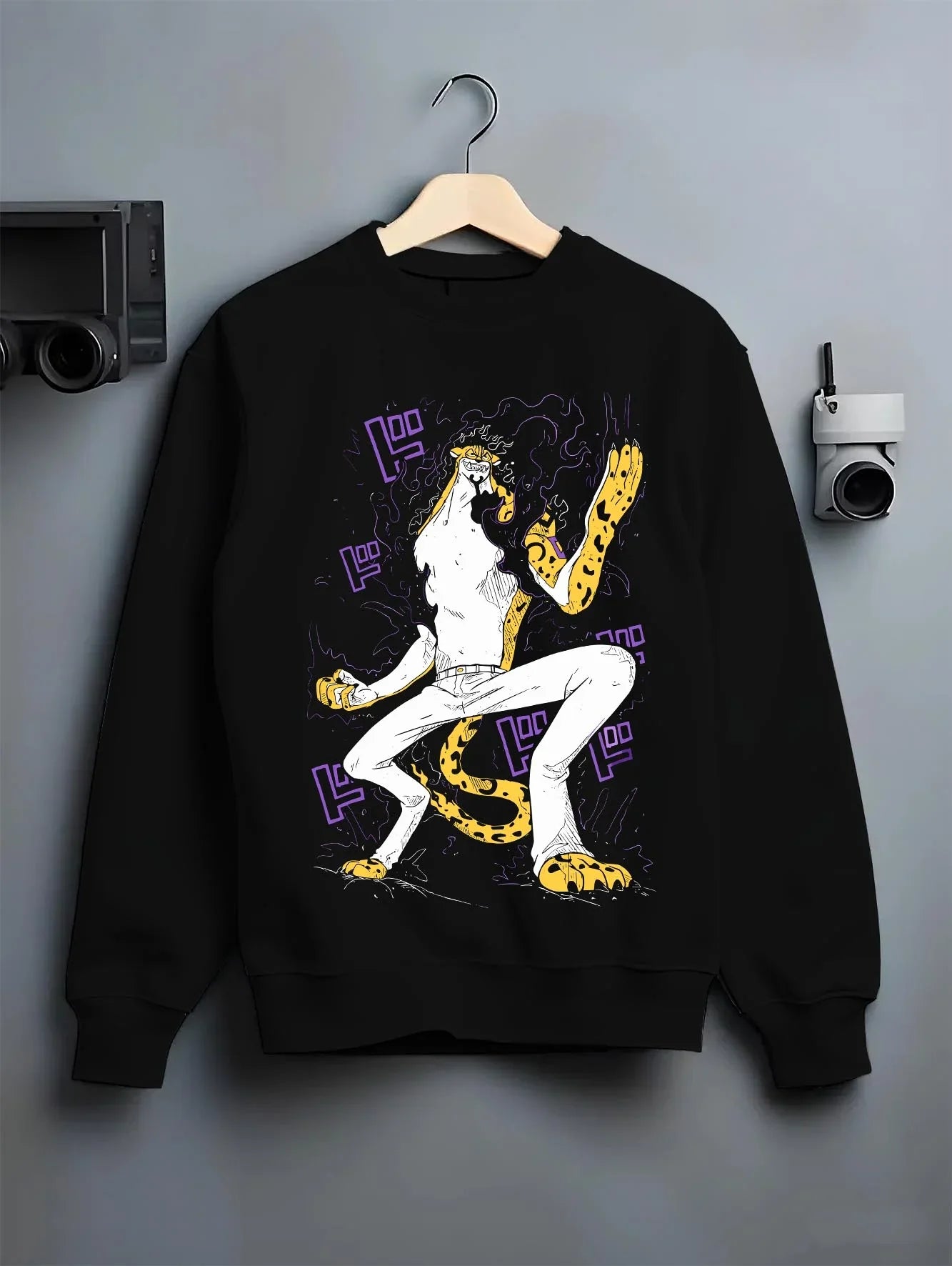 Black crewneck sweatshirt on hanger with Kaiju No. 8 Fiery Transformation Hoodie Heroic graphic streetwear graphic.