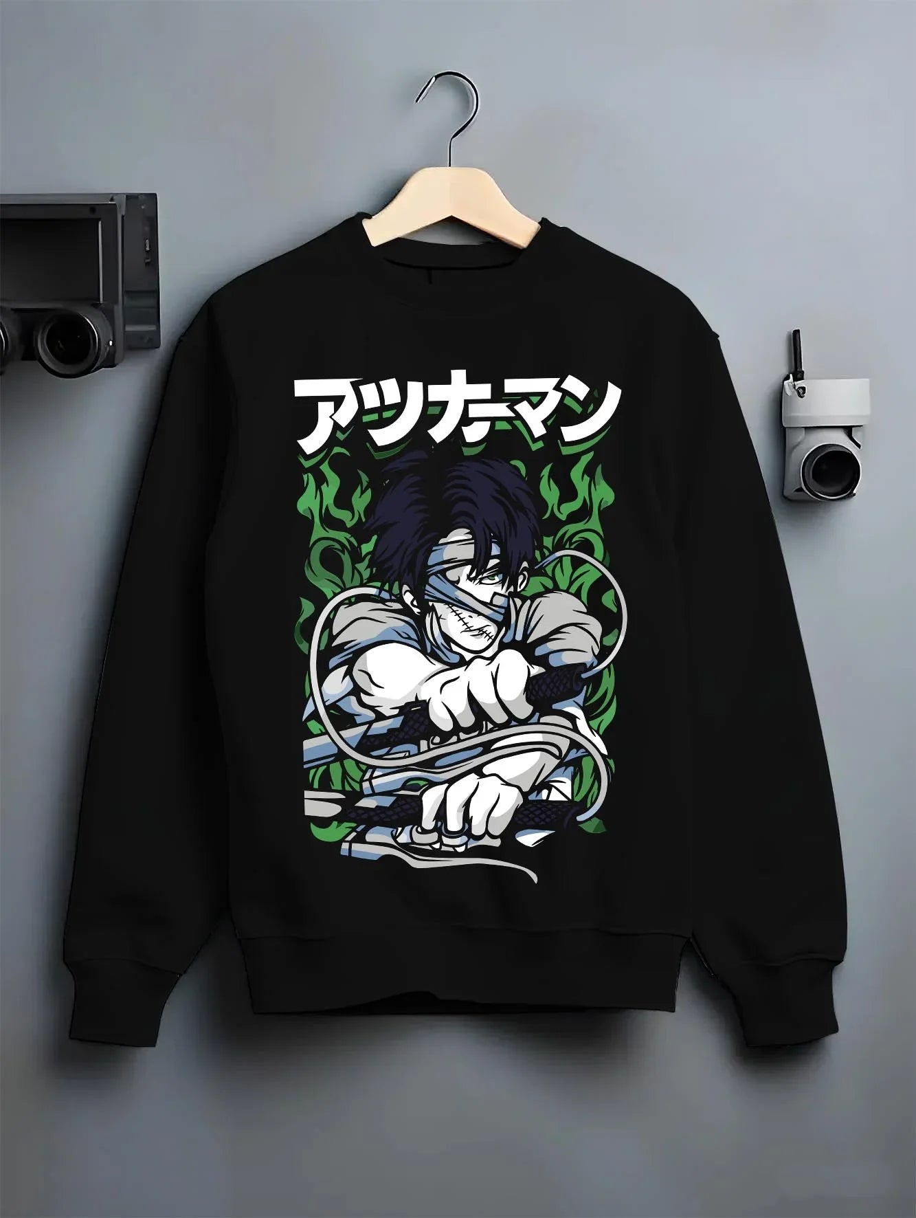 Black crewneck sweatshirt on hanger with Demon Slayer Corps Blood Clash Hoodie Intense graphic bold anime graphic.