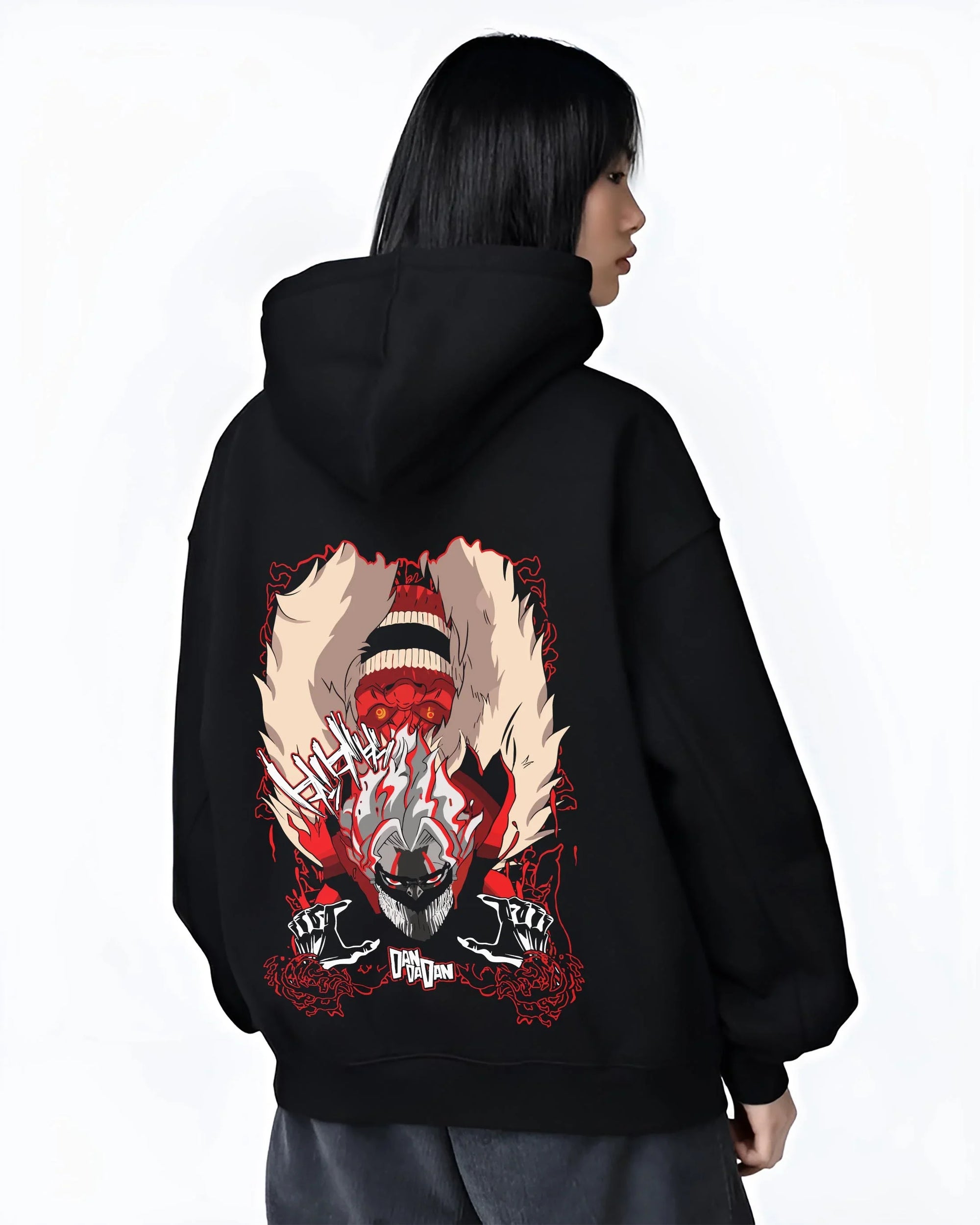 Black hoodie worn by female model, back view with Turbo Granny Dandadan Hoodie Retro Yokai Anime Horror graphic streetwear graphic.