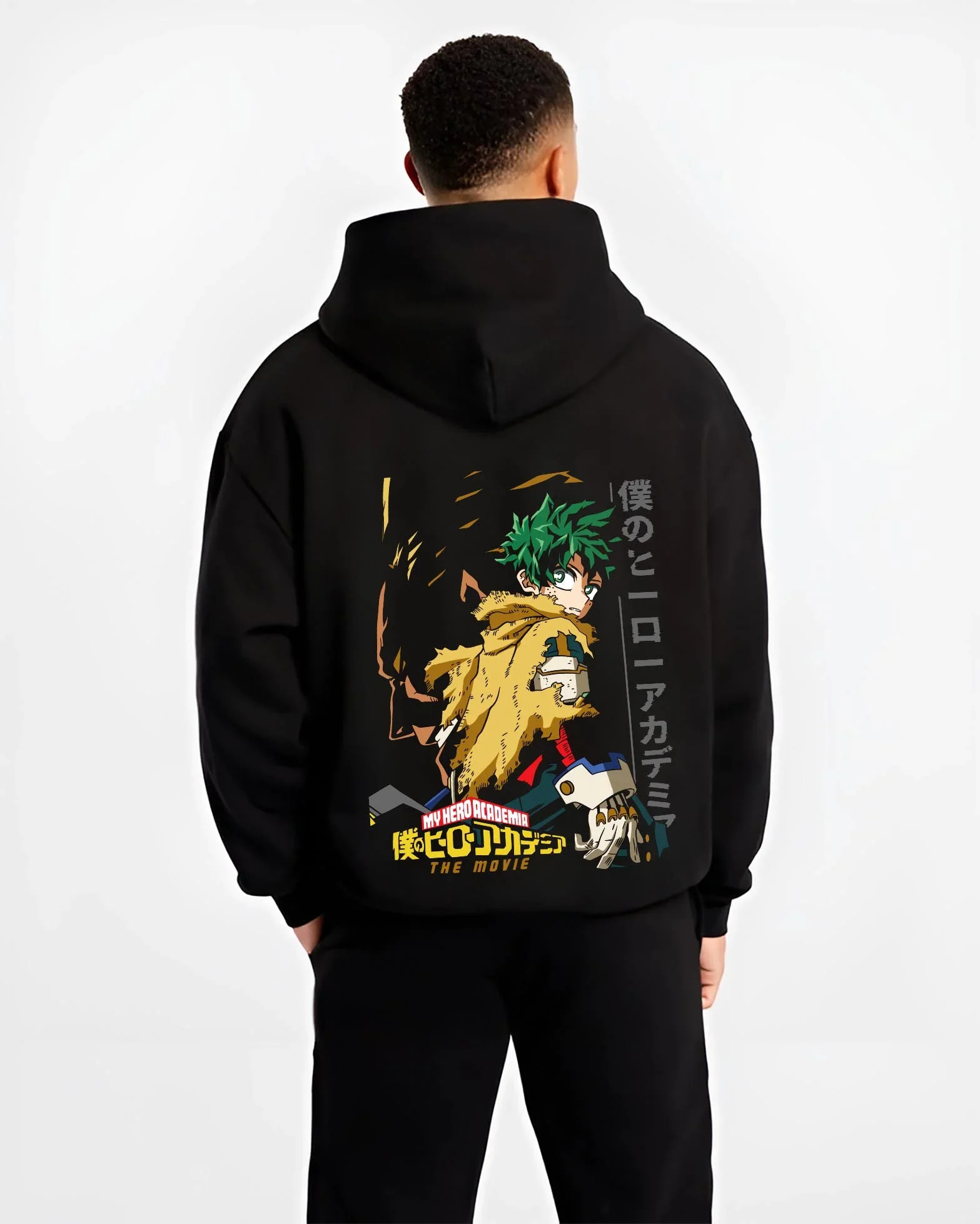 Black hoodie worn by male model, back view with Izuku Midoriya Hoodie My Hero Academia Hero graphic bold anime graphic.