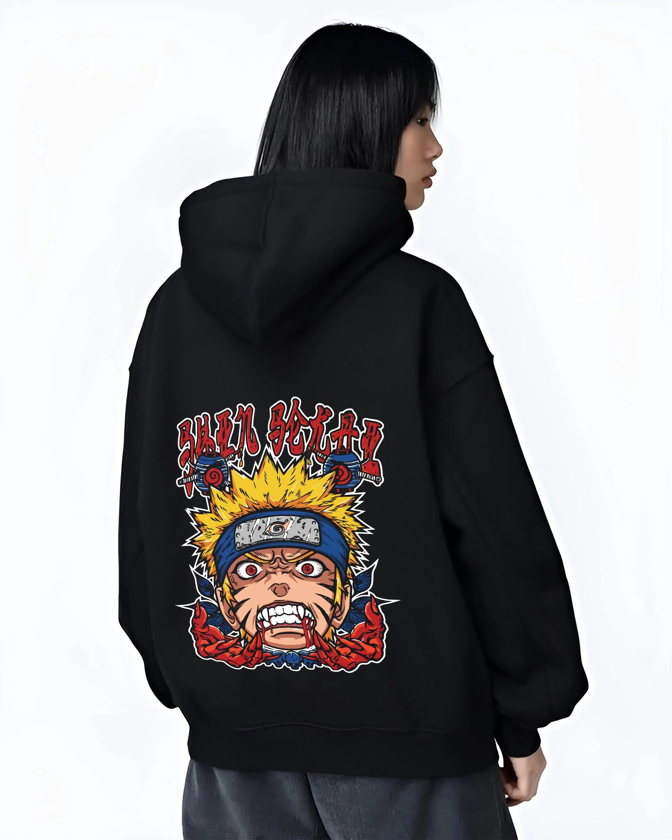 Black hoodie worn by female model, back view with Naruto Uzumaki Hoodie Naruto Shippuden Rage FX graphic bold anime graphic.