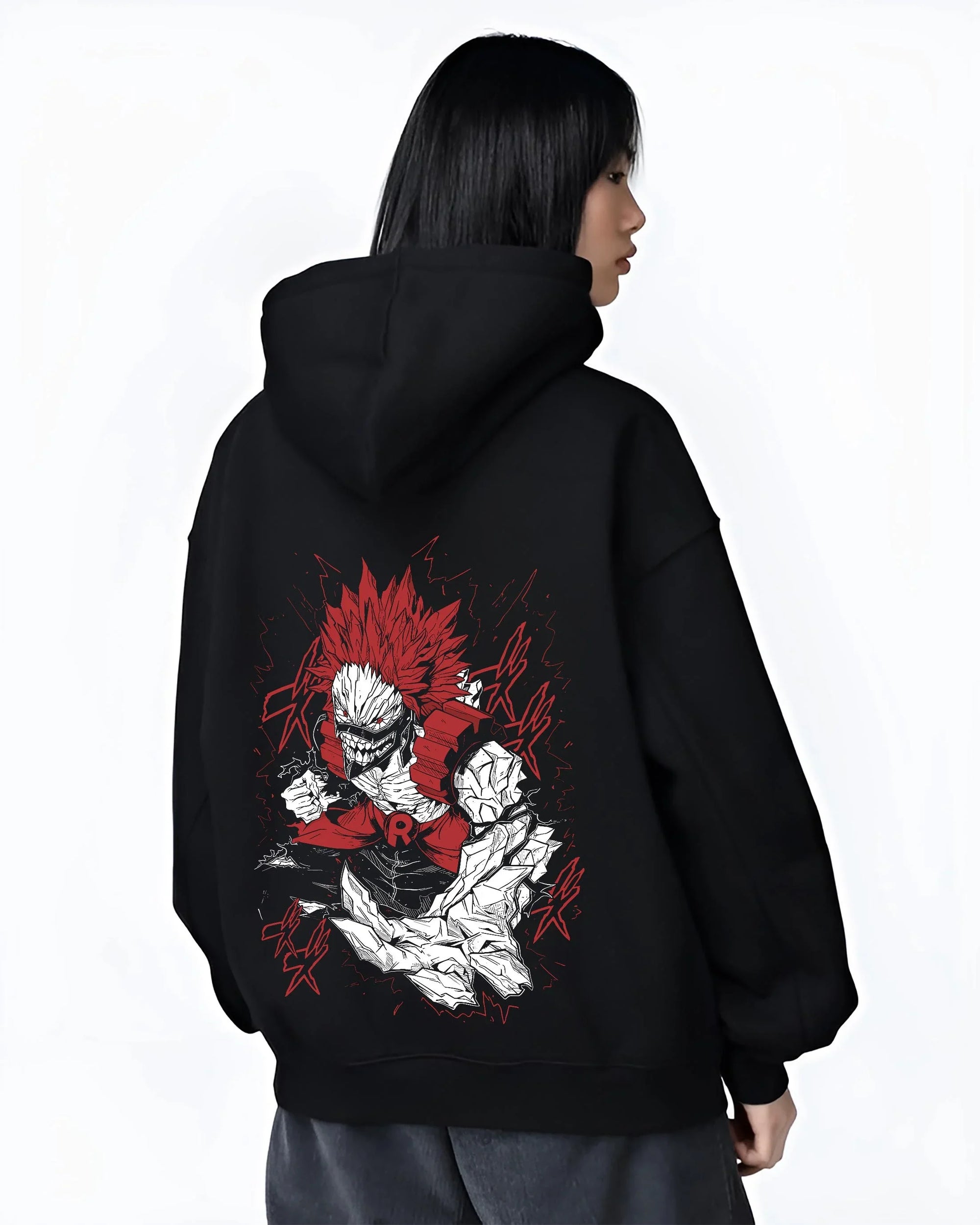 Black hoodie worn by female model, back view with Eijiro Kirishima Hoodie My Hero Academia Red Riot Hero graphic bold anime graphic.