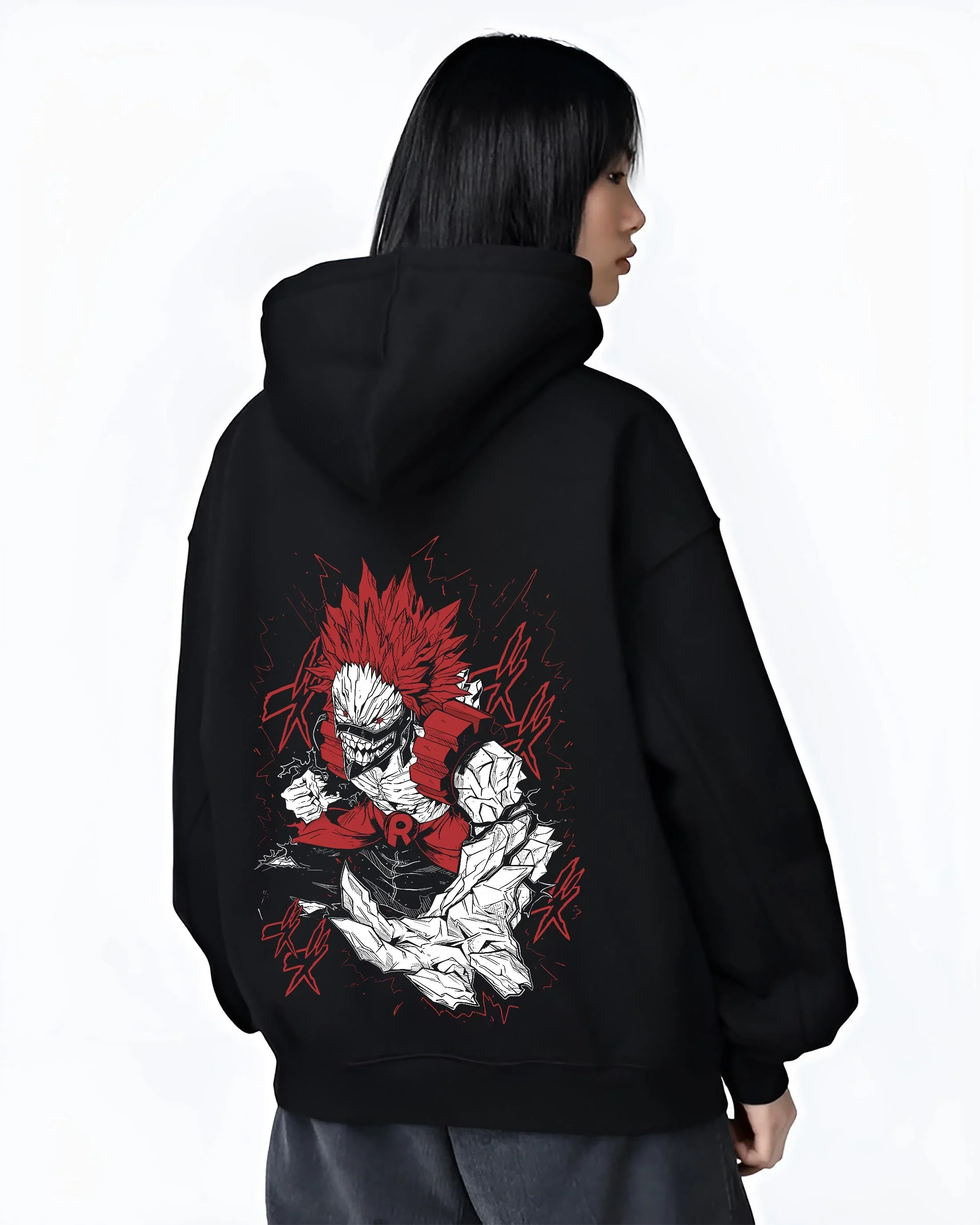 Black hoodie worn by female model, back view with Eijiro Kirishima Hoodie My Hero Academia Red Riot Hero graphic bold anime graphic.