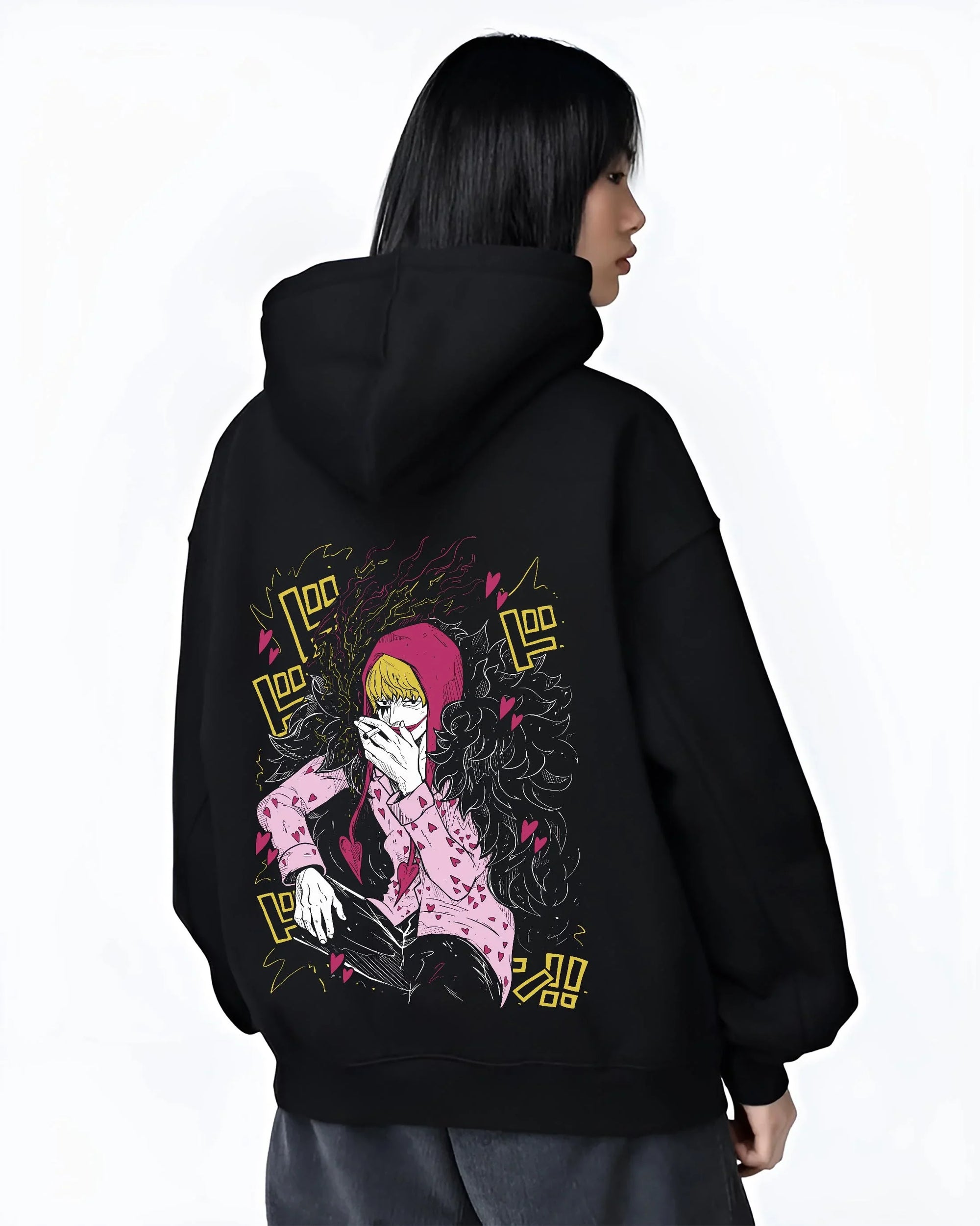 Black hoodie worn by female model, back view, highlighting nostalgic 90s inspired artwork of Corazon Donquixote Rosinante from One Piece.