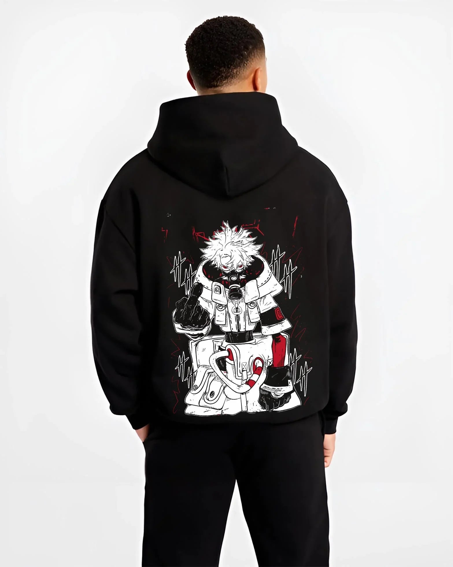 Black hoodie worn by male model, back view with Rudo Hoodie Gachiakuta Toxic Red Gas Mask graphic bold anime graphic.