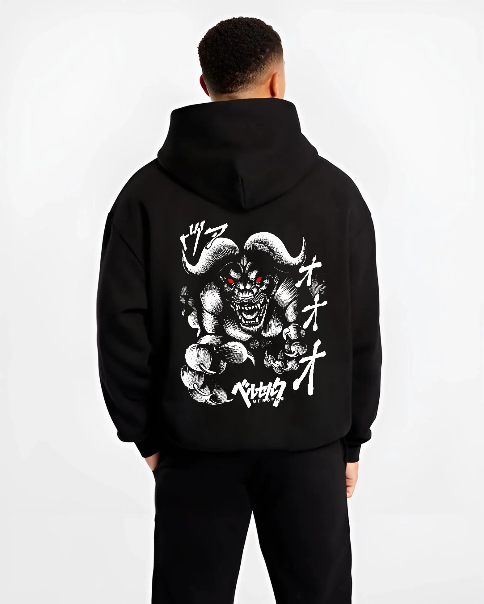 Black hoodie worn by male model, back view with Zodd Hoodie Berserk Apostle Demon Beast Swordsman graphic bold anime graphic.