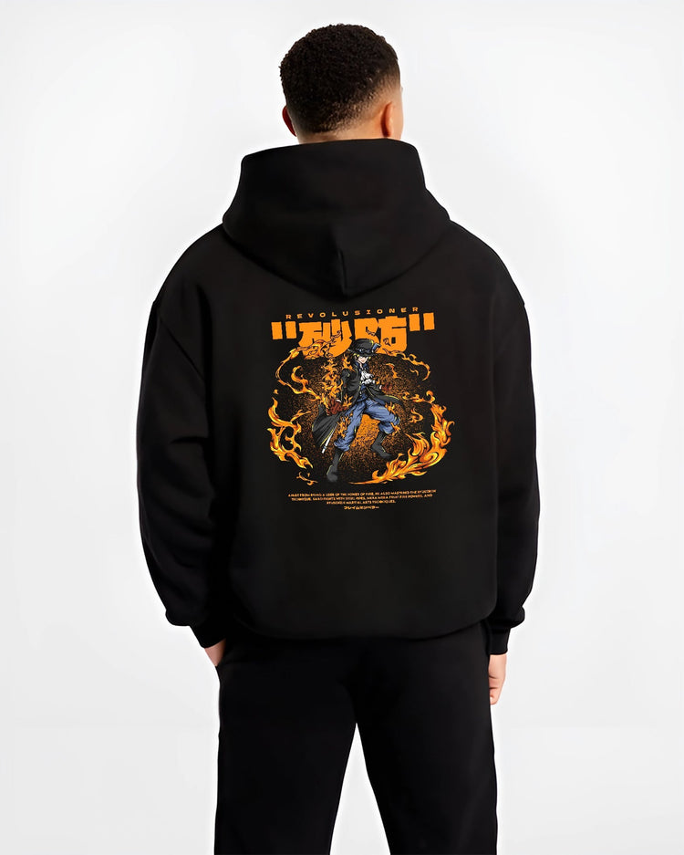 Black hoodie worn by a male model, back view, featuring Sabo One Piece fire powers Japanese animation streetwear design with bold retro manga artwork